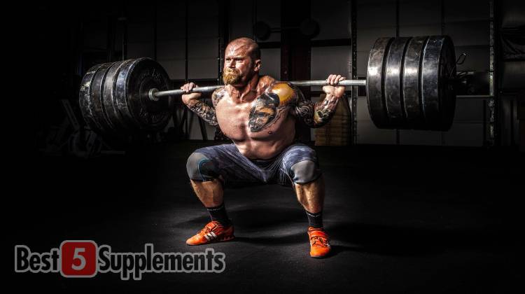 A man showing the best supplements to get you jacked