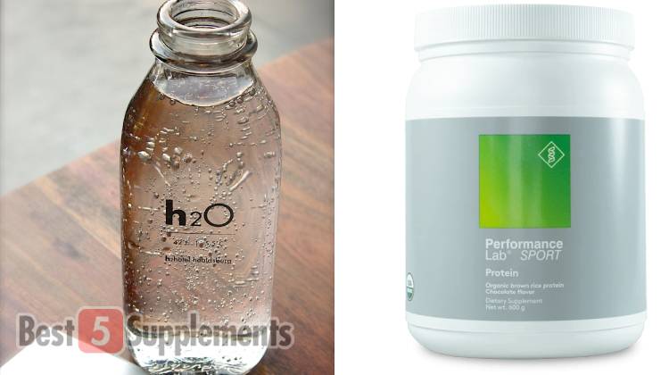 A bottle of water next to a container of Performance Lab Protein